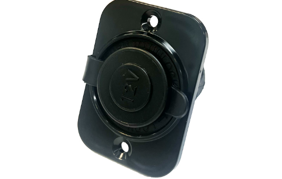  12V power outlet with a faceplate, typically used in vehicles or RVs to charge devices or power small appliances, featuring a sleek, secure design.